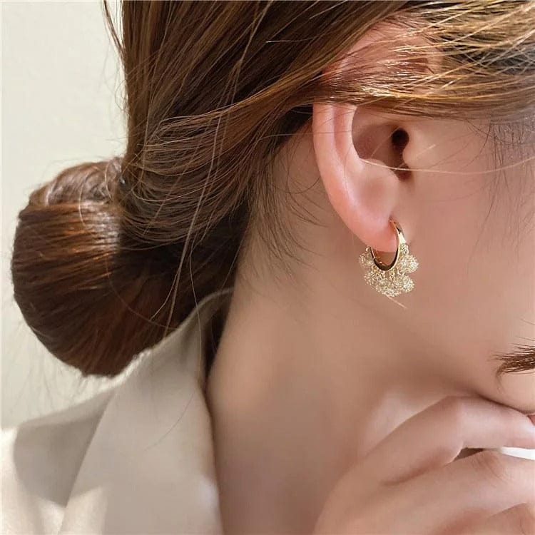 Aretes de borlas con diamantes incrustados