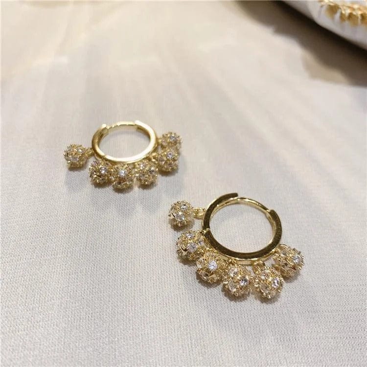 Aretes de borlas con diamantes incrustados